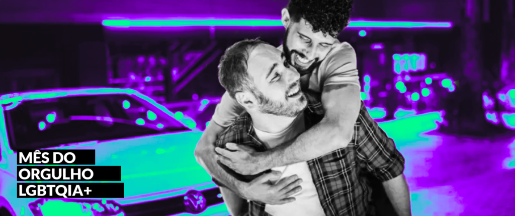 casal gay abraçado em propaganda para o mês do orgulho lgbtqia+